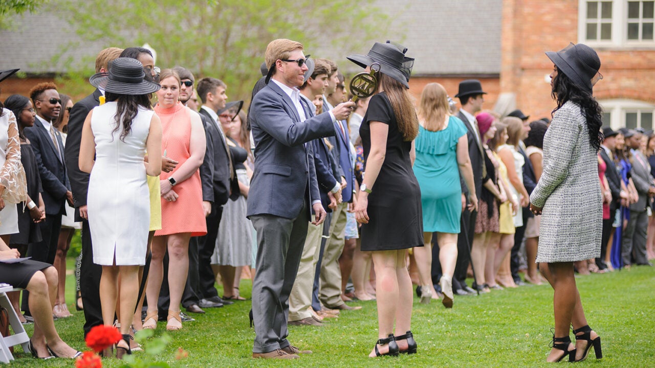 A group of students gathered outside for the Tapping on the Mound ceremony